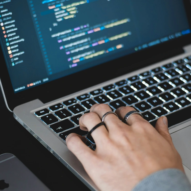 person typing on a computer